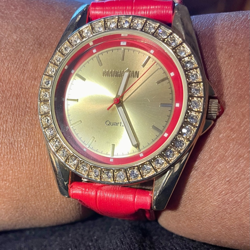 Croton’s Manhattan Red and Gold Bracelet Watch with genuine Red Leather Band